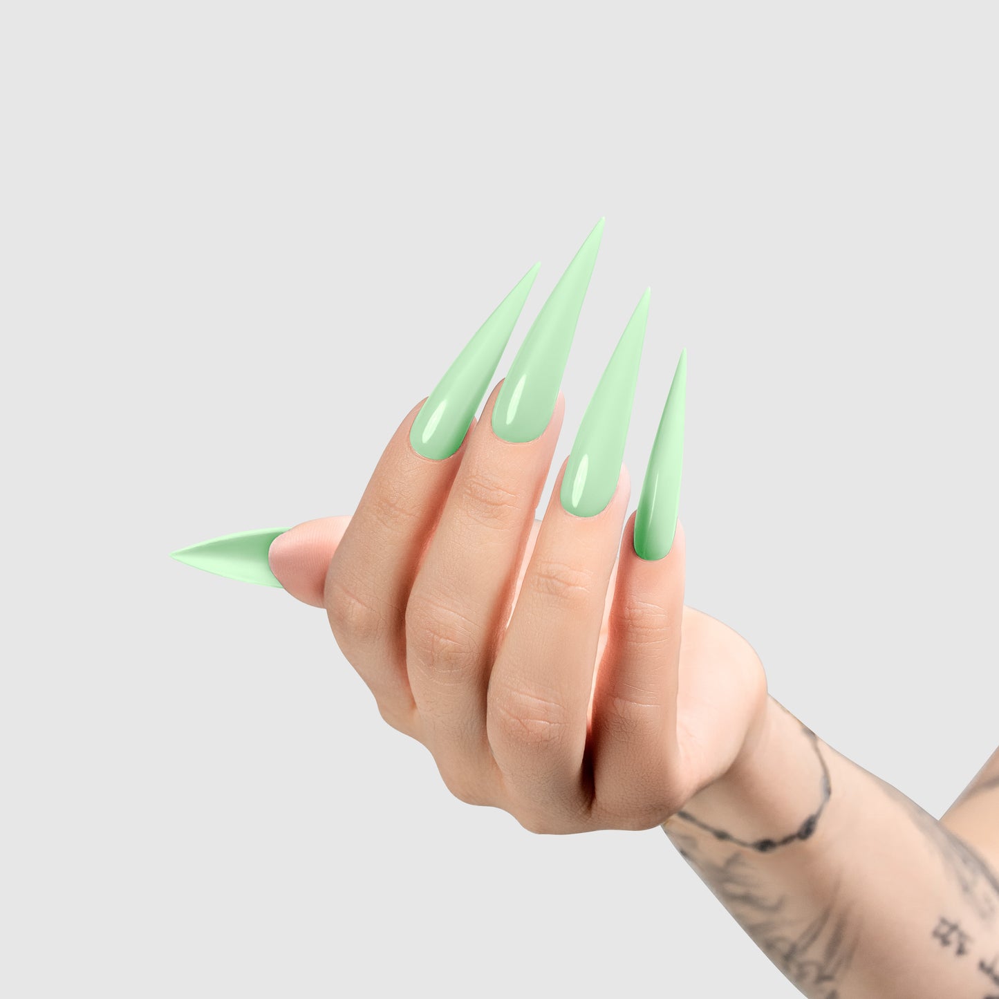 Chaun Legend Spearmint Secrets gel polish applied to light-skinned hand